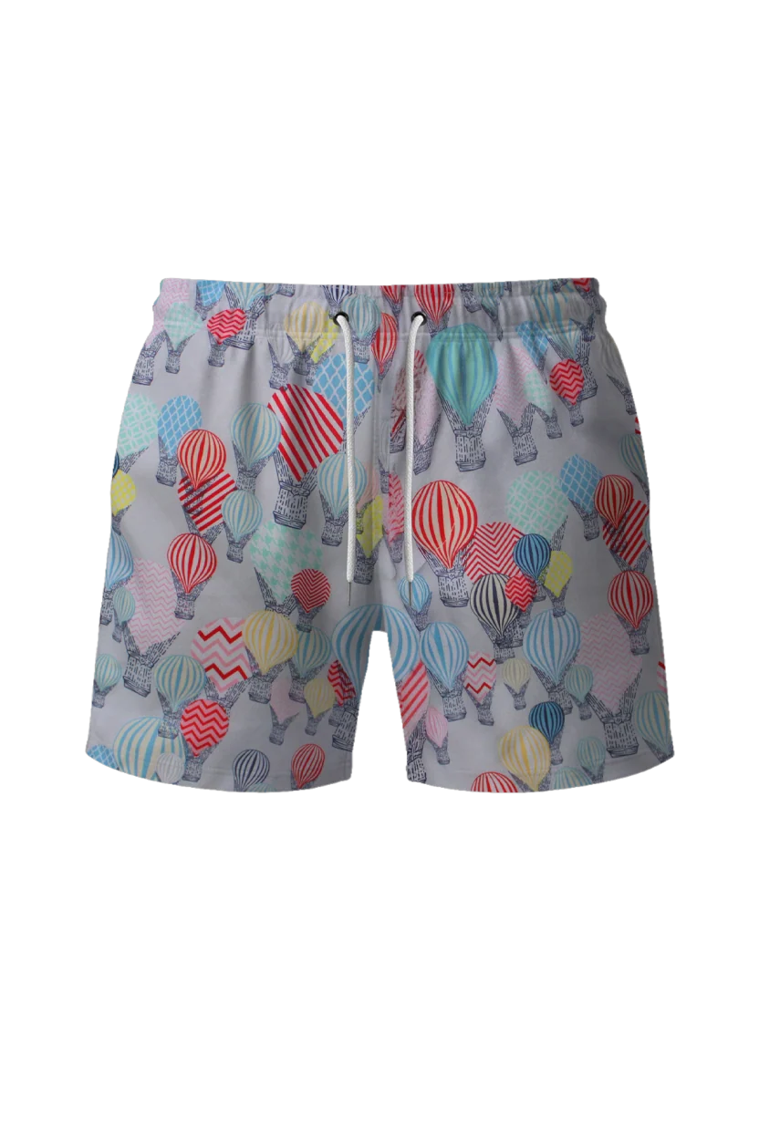 Short swimming trunks with a patterned fabric